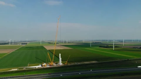 Construction of a windfarm in the Netherlands Stock Footage 289956263