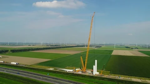Construction of a windfarm in the Netherlands Stock Footage 289956784