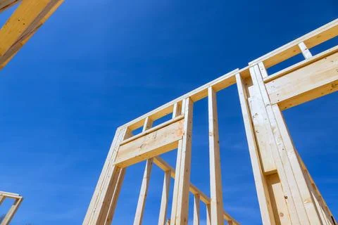 Construction of wooden beams structure under framing job new house Stock Photos