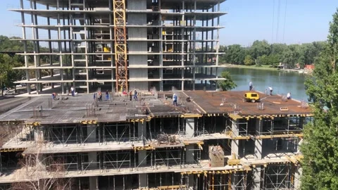 Construction work. Builders at the construction site. Working process at the Stock Footage 199094488