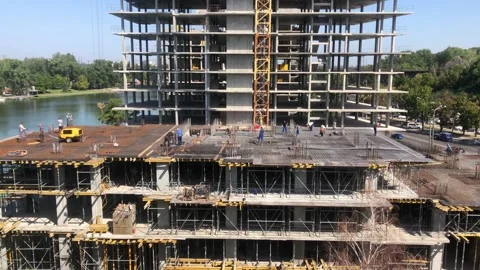 Construction work. Builders at the construction site. Working process at the Stock Footage 202612004