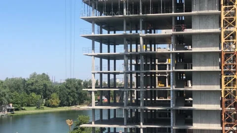 Construction work. Builders at the construction site. Working process at the Stock Footage 203815148