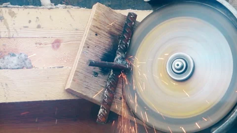 Construction work close-up on a summer day, flying sparks Stock Footage 112645032