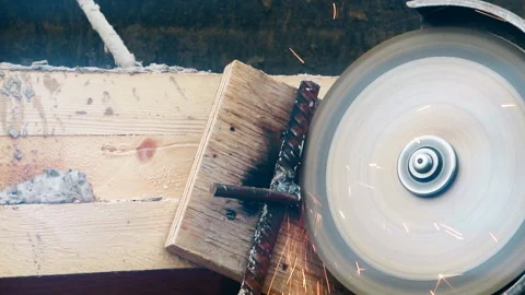 Construction work close-up on a summer day, flying sparks Stock Footage 113376240
