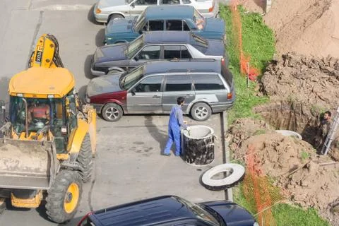 Construction work in a confined space. Стоковые фото