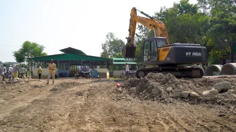 Construction work continuing during flood and earthquake in India Stock Footage 321039674