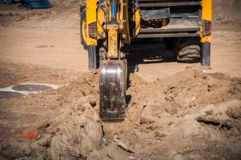 Construction work with digger machines Stock Photos
