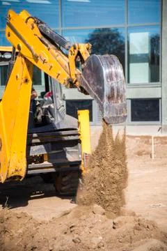 Construction work with digger machines Stock Photos