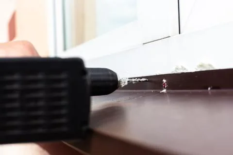 Construction work - drilling holes. Stock Photos