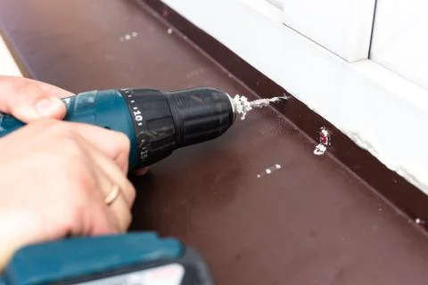 Construction work - drilling holes. Stock Photos