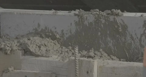 Construction work, formwork, applying cement, construction mixture Stock Footage 305639846