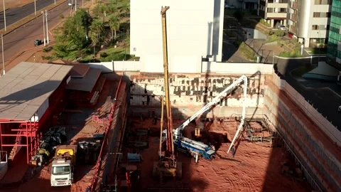 Construction work on the foundation of a New Apartment Building Stock Footage 283410212