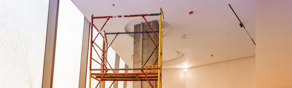 Construction work on the interior decoration of a modern office or apartment Stock Photos