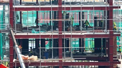 Construction work on a multi-level building Stock Footage 314462872