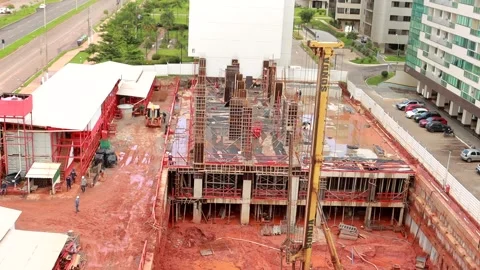 Construction work of a New Apartment Building on a rainy day Vídeo Stock 293022804