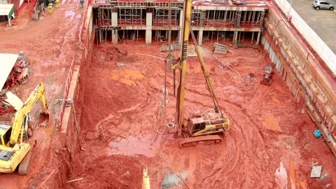 Construction work of a New Apartment Building on a rainy day Stock Footage 293022902