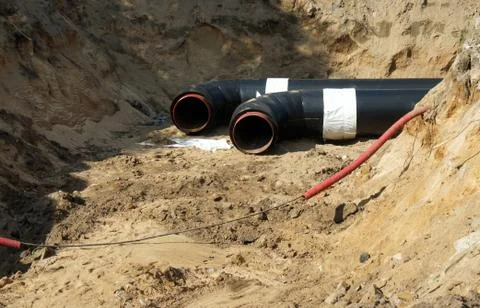Construction work. Pipe laying. Repair of communications. Stock Photos