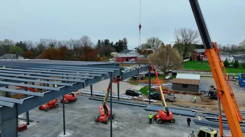 Construction Work in Progress at a Building Site With Cranes and Equipment .. Stock Footage 333128048