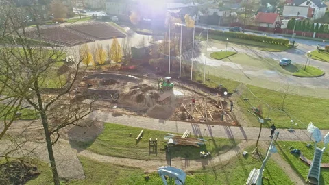 Construction work in progress in charming town neighborhood, aerial view Stock Footage 259149781