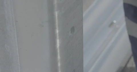 Construction work, road construction, installation of barrier fencing Stock Footage 305639866