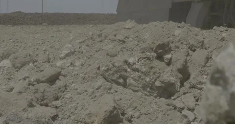 Construction work, road equipment pouring earth, brown earth, soil, ground Stock Footage 305641580