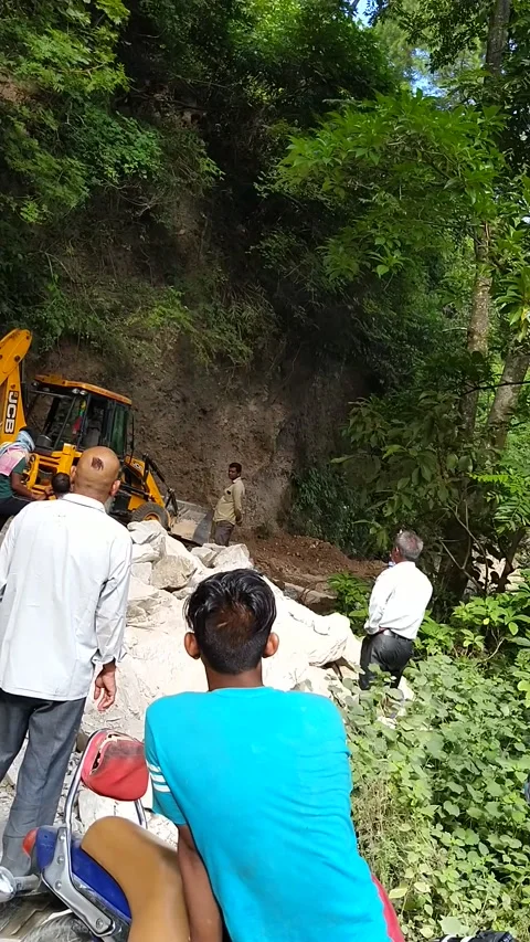 Construction work on the road in the hilly area in uttarakhand, India Stock Footage 139862128