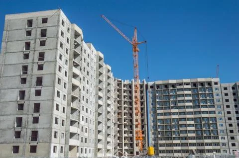 Construction work site and hoisting tower cranes 스톡 사진