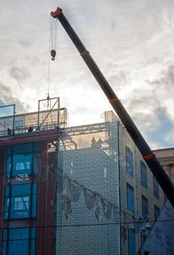 Construction work on the sunset background. Kiev, Ukraine Stock Photos