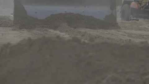 Construction work, tractor levels sand Stock Footage 278398030