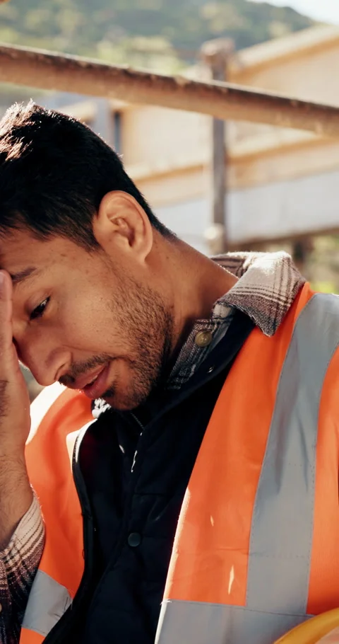Construction, worker and headache with helmet outdoor, overwhelmed or overworked Stock Footage 336265545