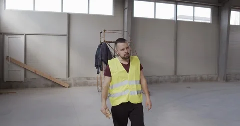 A construction worker and looking for something. Stock Footage 127104513