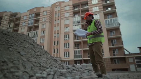 Construction worker angry with cell phone and checklist control imported Stock Footage 156332892