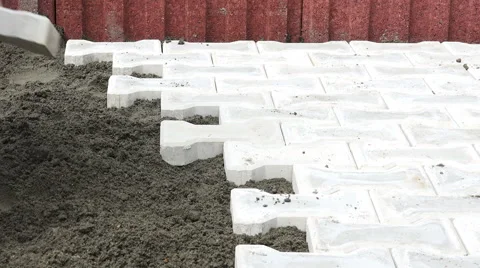 Construction worker arranging pavement 4K Stock Footage 68166659