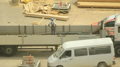 Construction worker attaching a crane load Stock Footage 21452025
