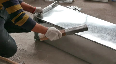 Construction Worker Banging on Metal Air Duct - 4K Footage Stock Footage 51218667