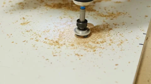 Construction worker begins drilling hole with milling cutter Stock Footage 304402341