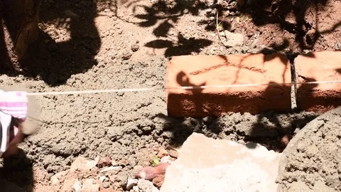 Construction-worker-brick-mortar-curb Stock Footage 75673182