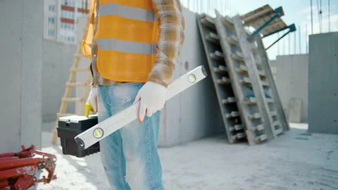 Construction Worker with bubble level meter and toolbox Stock-Footage 241168169