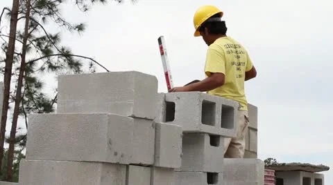 A Construction Worker Building a Masonry Wall Video stock 21111597