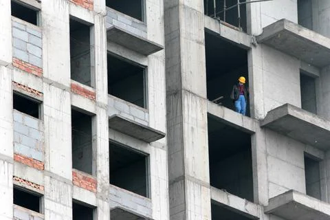 A construction worker at a building site Stock Photos