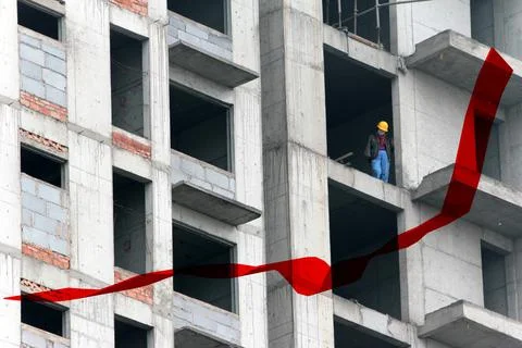 A construction worker at a building site Stock Photos