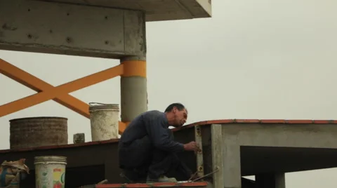 Construction Worker, Building Stairs and Psychedelic Railing to modern overpass Stock Footage 48915094