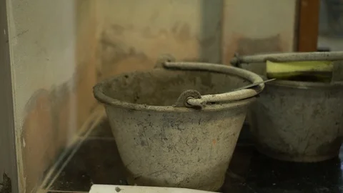 Construction worker builds house, closeup view at construction site Vídeos de archivo 86484827