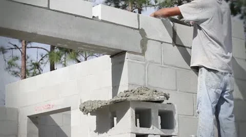 Construction Worker Builds a Masonry Wall Video stock 21110923