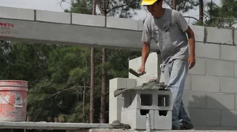 A Construction Worker Builds a Masonry Wall Video stock 21111237