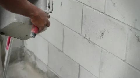 Construction Worker Builds a Masonry Wall Video stock 21111304