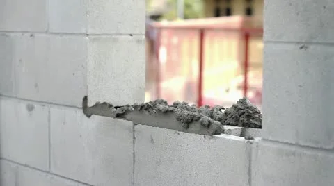 A Construction Worker Builds a Masonry Wall Video stock 21111395