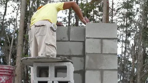 A Construction Worker Builds a Masonry Wall Stock-Footage 21111454