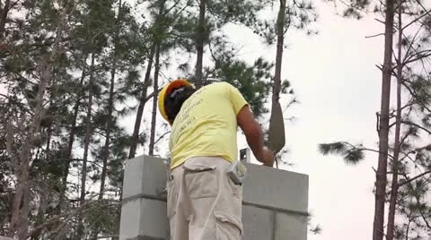 A Construction Worker Builds a Masonry Wall Video stock 21111867