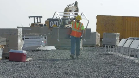 Construction Worker Carrying Load Stock Footage 80208450